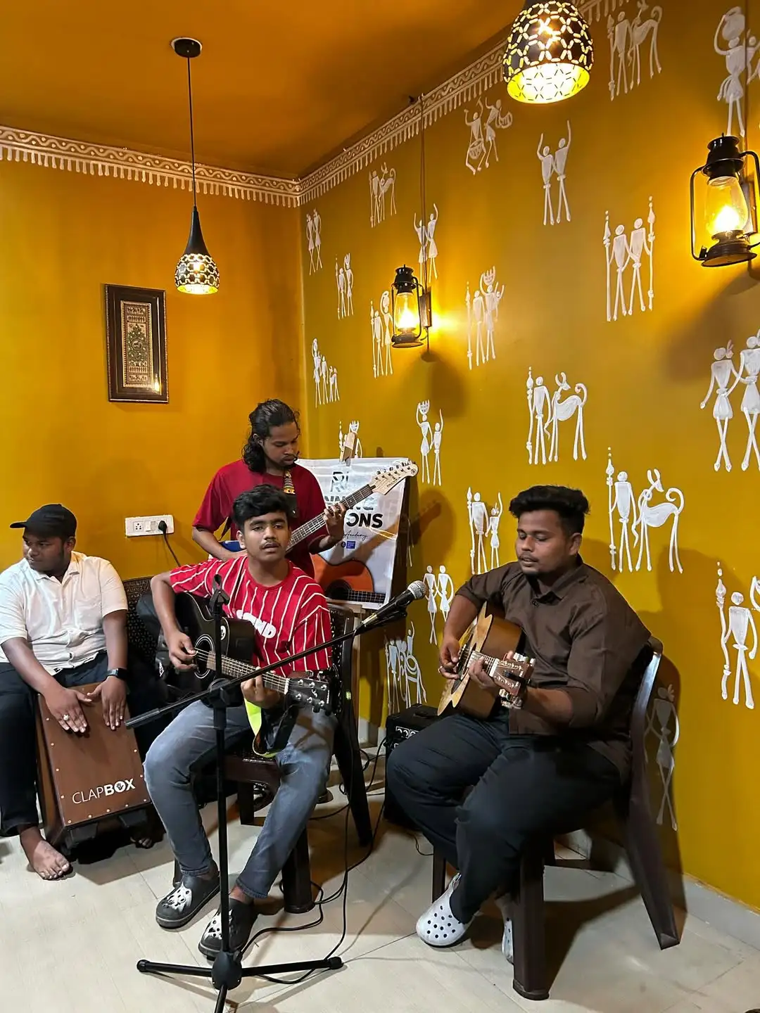 Live acoustic music performance at JOMHA Restaurant with cultural ambiance